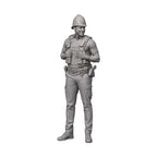 A grayscale 3D model or miniature figure of a soldier in tactical gear, including a helmet, vest, and boots, shown against a plain white background.